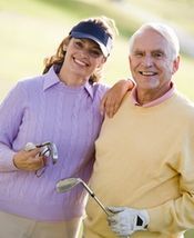 Retired Couple Golfing